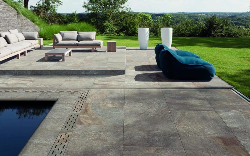 porcelain pavers around a pool